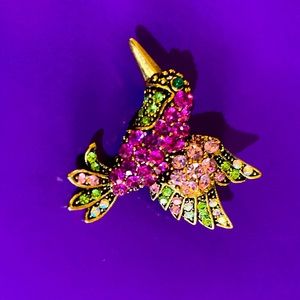 Beautiful hummingbird brooch/ pin with colorful rhinestones and gold beak.